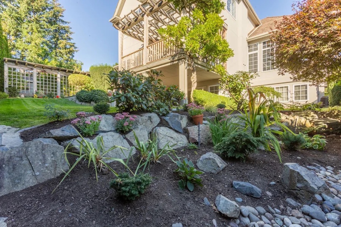 Stone steps into a planted bed